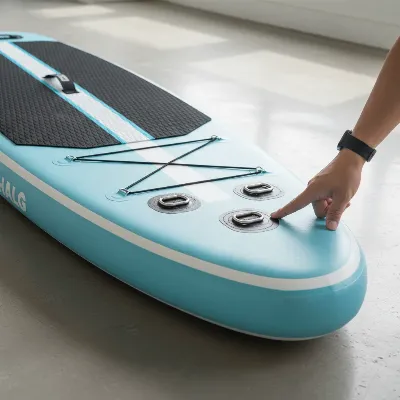 Locating D-rings on an inflated paddle board deck for kayak seat attachment